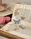 fable-england-blue-butterfly-huggie-ohrringe-blau-emaille image 6